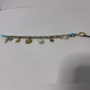 White House Black Market Gold and Blue Charm Bracelet